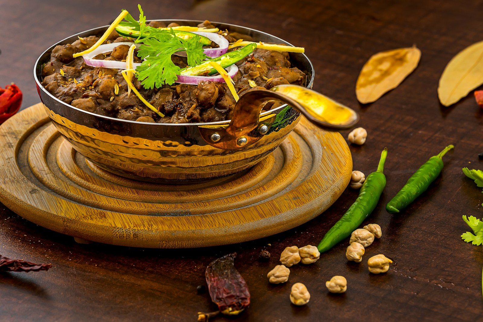 a bowl of food on a wooden table